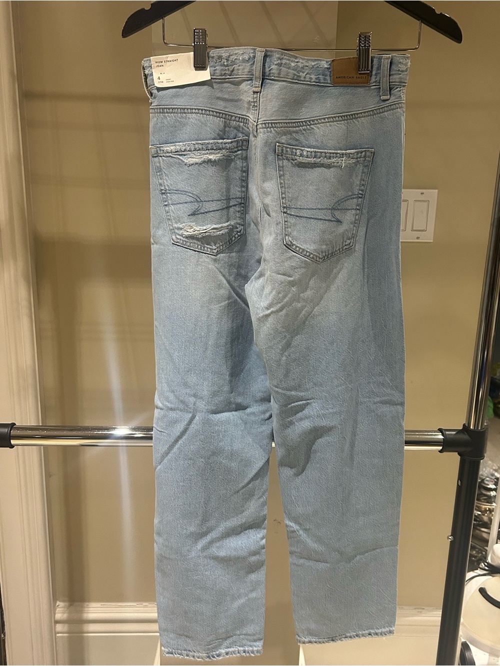 Light Wash Distressed Ripped Jeans - Picture 2 of 3